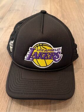 New Era Black Los Angeles Lakers Trucker Hat with Purple & Yellow Logo